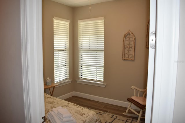 2735 Lavandula Ct, North Port, FL 34289 - bedroom with baseboards and wood finished floors