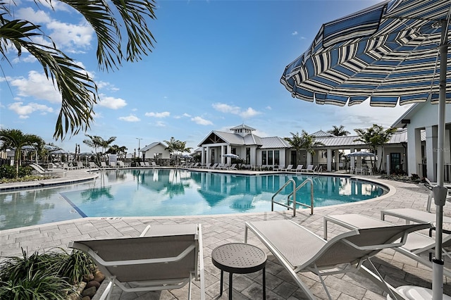 pool with a patio area