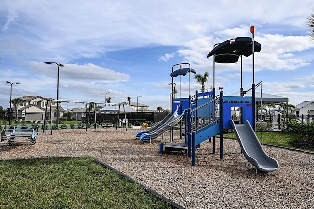 community jungle gym with fence