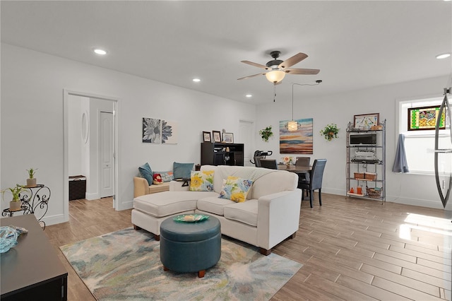 1940 Bell Creek Loop, Fruitland Park, FL 34731 - living area with ceiling fan, light wood-type flooring, recessed lighting, and baseboards