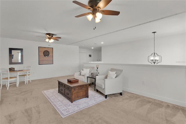 1940 Bell Creek Loop, Fruitland Park, FL 34731 - living area featuring light carpet, a ceiling fan, a chandelier, baseboards, and recessed lighting