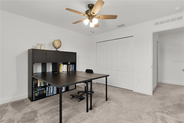 1940 Bell Creek Loop, Fruitland Park, FL 34731 - office area with light carpet, ceiling fan, and baseboards