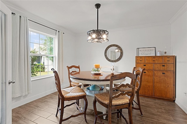 1940 Bell Creek Loop, Fruitland Park, FL 34731 - dining area with ornamental molding, a chandelier, wood finished floors, and baseboards