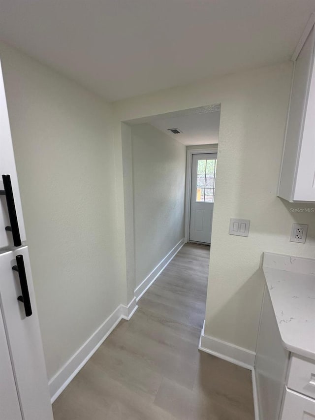 2217 Azalea Ct, Lakeland, FL 33815 - hall featuring baseboards