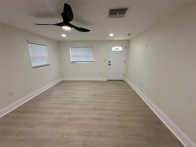 2217 Azalea Ct, Lakeland, FL 33815 - foyer featuring ceiling fan, light wood finished floors, recessed lighting, and baseboards