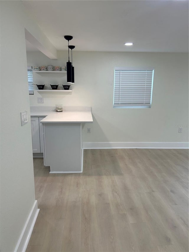 2217 Azalea Ct, Lakeland, FL 33815 - unfurnished dining area featuring baseboards, light wood-style flooring, and recessed lighting
