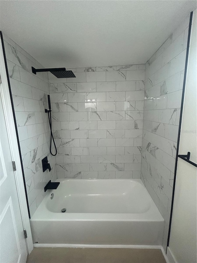 2217 Azalea Ct, Lakeland, FL 33815 - full bath featuring shower / tub combination and baseboards