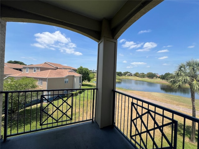7320 Westpointe Blvd Unit 531, Orlando, FL 32835 - balcony featuring a water view