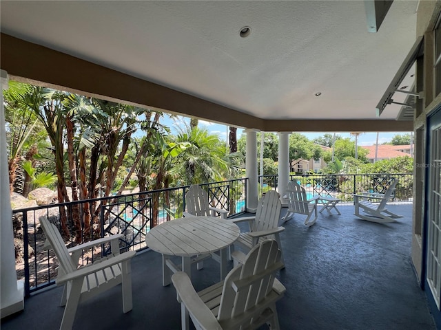 7320 Westpointe Blvd Unit 531, Orlando, FL 32835 - view of patio featuring a balcony