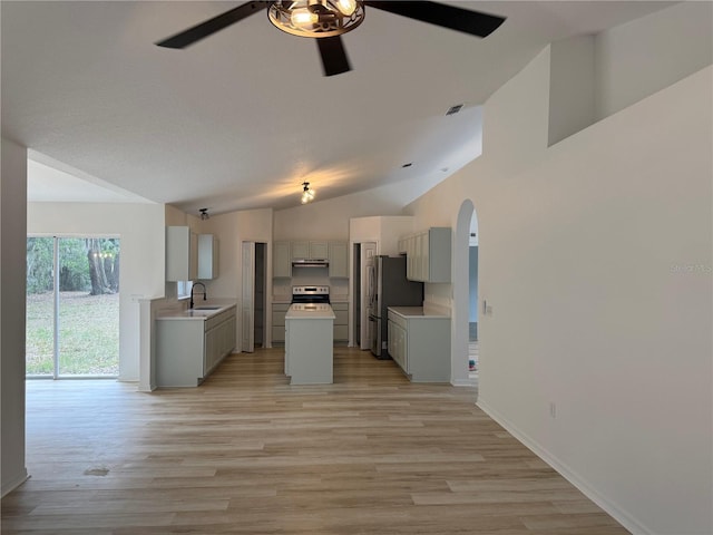 901 Cascades Park Trl, Deland, FL 32720 - kitchen featuring gray cabinetry, stainless steel appliances, ceiling fan, vaulted ceiling, and a sink