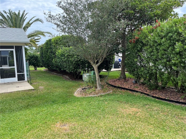 1305 Guerra Ave, The Villages, FL 32159 - view of green lawn with a sunroom