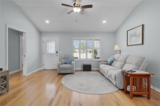 1305 Guerra Ave, The Villages, FL 32159 - living area featuring vaulted ceiling, light wood-style floors, ceiling fan, baseboards, and recessed lighting