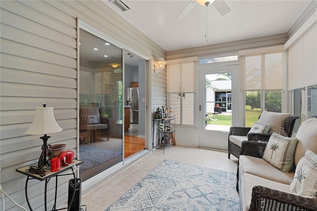 1305 Guerra Ave, The Villages, FL 32159 - sunroom with a ceiling fan