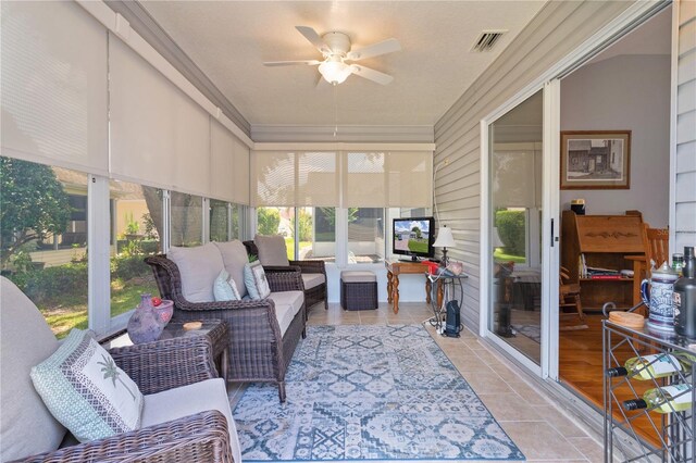 1305 Guerra Ave, The Villages, FL 32159 - sunroom / solarium featuring ceiling fan and an outdoor hangout area