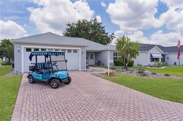 1305 Guerra Ave, The Villages, FL 32159 - single story home featuring decorative driveway, a front yard, and a garage