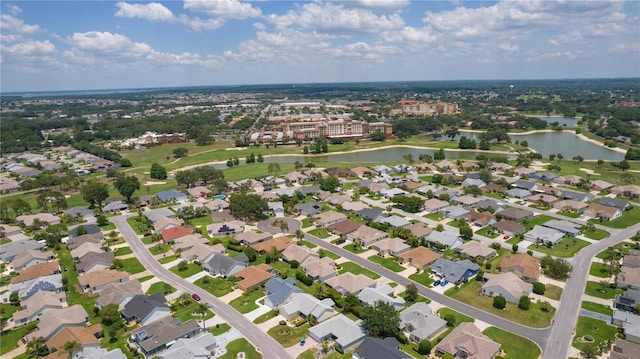 1305 Guerra Ave, The Villages, FL 32159 - aerial view of property's location featuring a large body of water, a golf club, and nearby suburban area