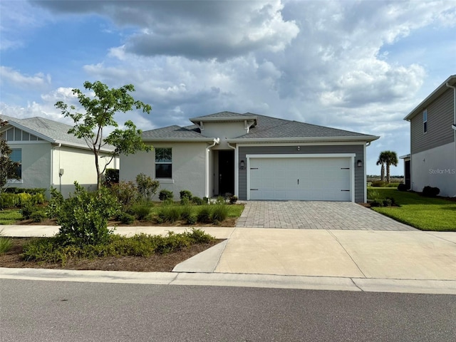 43819 Cattleman Dr, Punta Gorda, FL 33982 - view of front of home featuring driveway and a garage