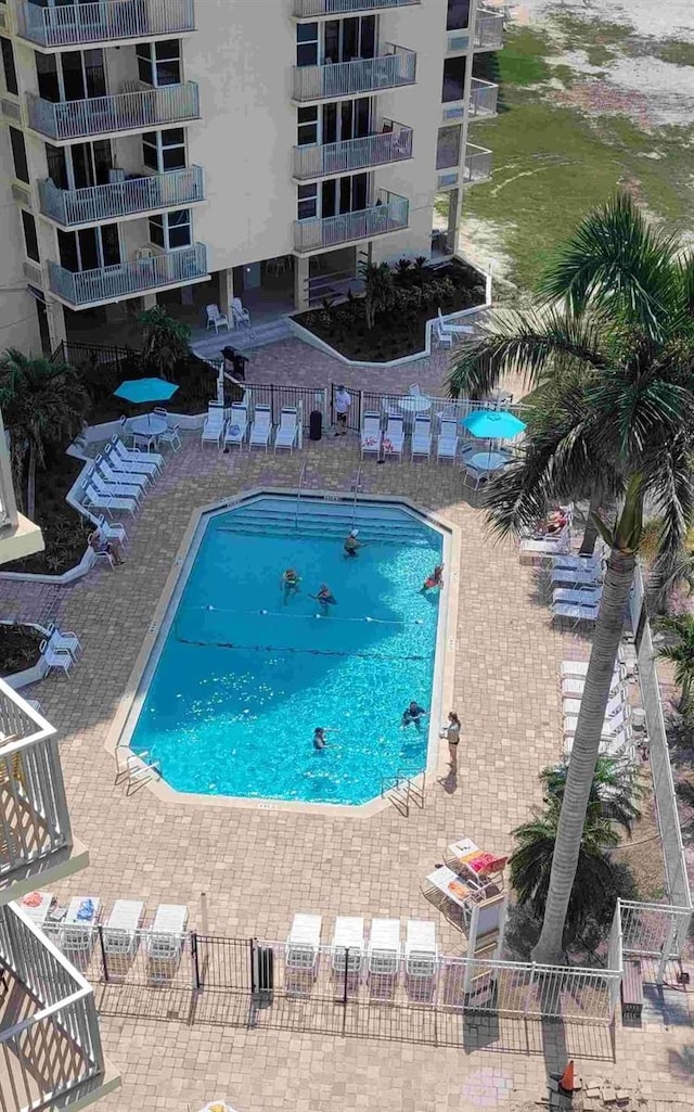 community pool with a patio