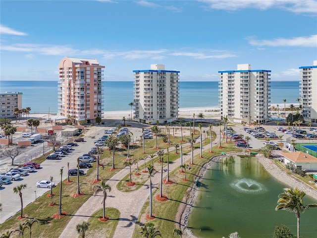 view of urban area with a large body of water