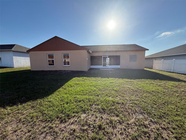 6608 Madeira Ave, Lakeland, FL 33811 - rear view of house with stucco siding