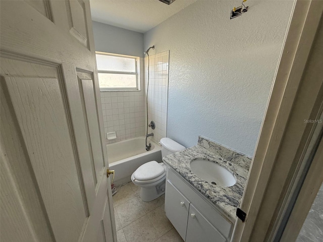 6608 Madeira Ave, Lakeland, FL 33811 - full bath with a textured wall, toilet, shower / tub combination, and vanity