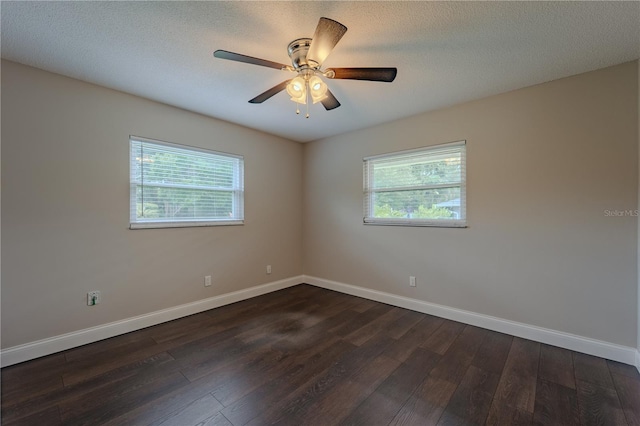 4514 Crichton Ln, Orlando, FL 32806 - spare room with dark wood-style floors, baseboards, and ceiling fan