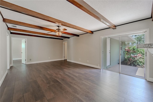 4514 Crichton Ln, Orlando, FL 32806 - unfurnished room with dark wood finished floors, a textured ceiling, ceiling fan, beam ceiling, and baseboards