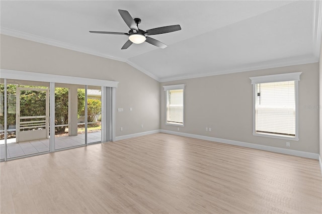 7214 SE 171st Brookhaven Pl, The Villages, FL 32162 - spare room with ornamental molding, vaulted ceiling, wood finished floors, baseboards, and ceiling fan