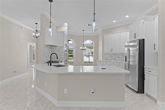 7214 SE 171st Brookhaven Pl, The Villages, FL 32162 - kitchen with appliances with stainless steel finishes, a sink, light marble finish floors, crown molding, and tasteful backsplash