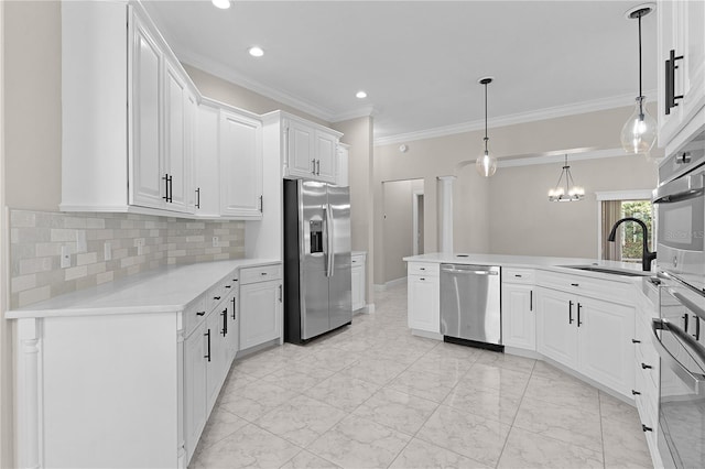 7214 SE 171st Brookhaven Pl, The Villages, FL 32162 - kitchen featuring appliances with stainless steel finishes, white cabinetry, decorative backsplash, a sink, and light marble finish flooring