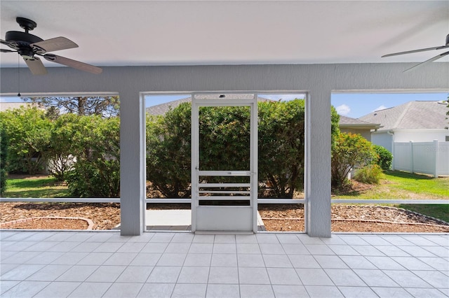 7214 SE 171st Brookhaven Pl, The Villages, FL 32162 - unfurnished sunroom featuring ceiling fan and plenty of natural light