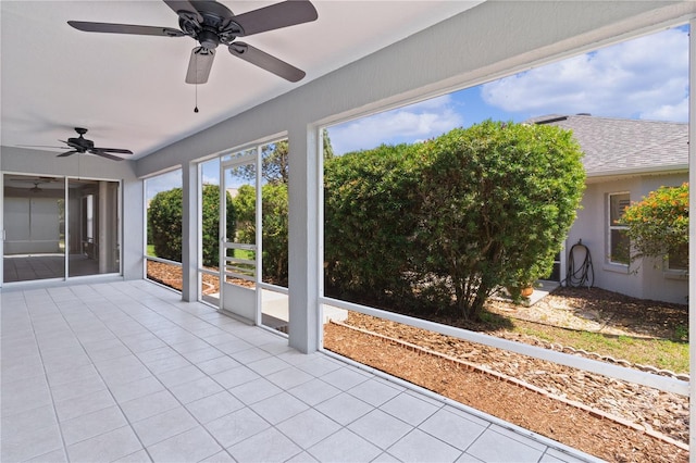 7214 SE 171st Brookhaven Pl, The Villages, FL 32162 - unfurnished sunroom with ceiling fan