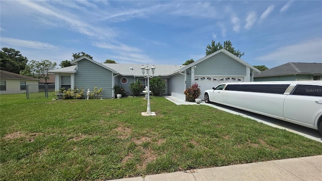 303 Silk Oak Dr, Kissimmee, FL 34743 - single story home with an attached garage and driveway