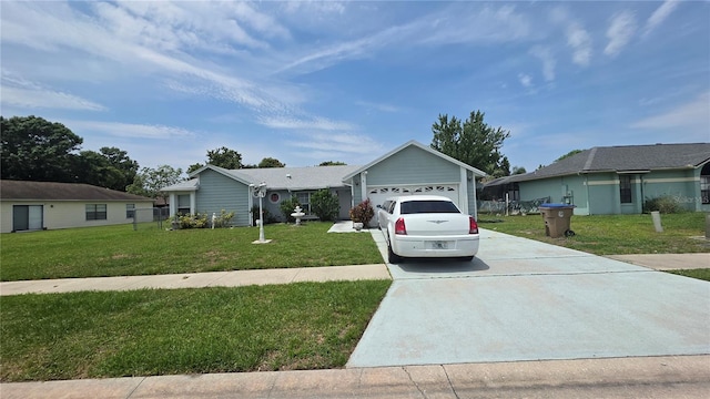 303 Silk Oak Dr, Kissimmee, FL 34743 - ranch-style home featuring driveway, a front lawn, and an attached garage
