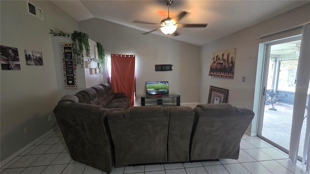 303 Silk Oak Dr, Kissimmee, FL 34743 - living area with vaulted ceiling, ceiling fan, light tile patterned flooring, and baseboards