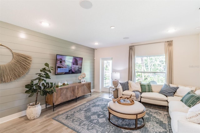 2046 Sunset Preserve Way, Port Charlotte, FL 33953 - living area with light wood-type flooring, wood walls, baseboards, and recessed lighting