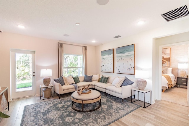 2046 Sunset Preserve Way, Port Charlotte, FL 33953 - living area featuring light wood-style floors and recessed lighting