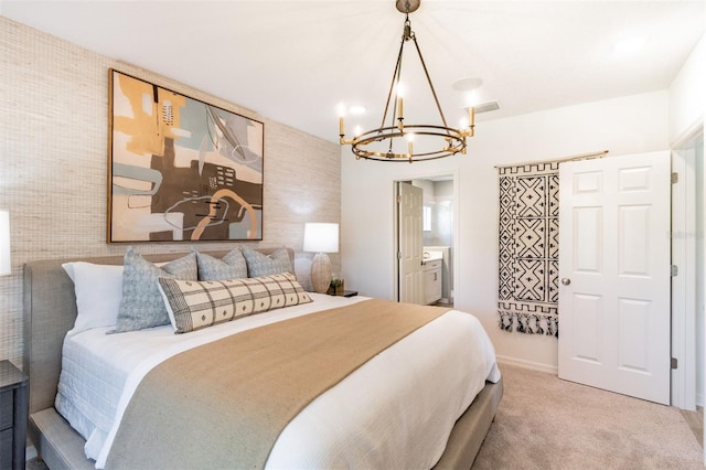 2046 Sunset Preserve Way, Port Charlotte, FL 33953 - carpeted bedroom featuring a chandelier and ensuite bathroom