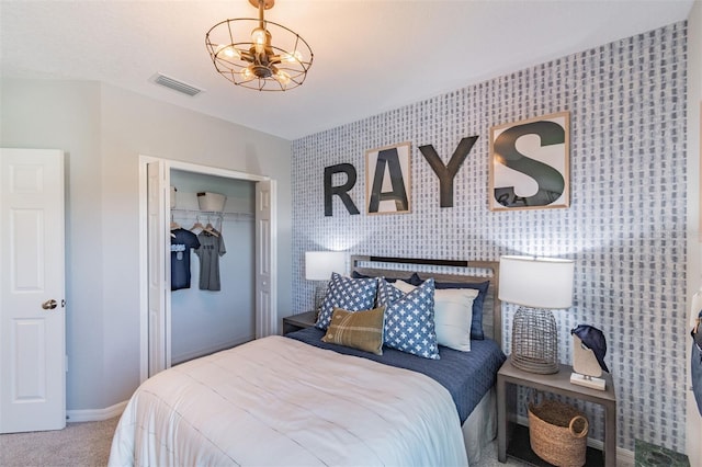 2046 Sunset Preserve Way, Port Charlotte, FL 33953 - carpeted bedroom featuring a closet, baseboards, and wallpapered walls