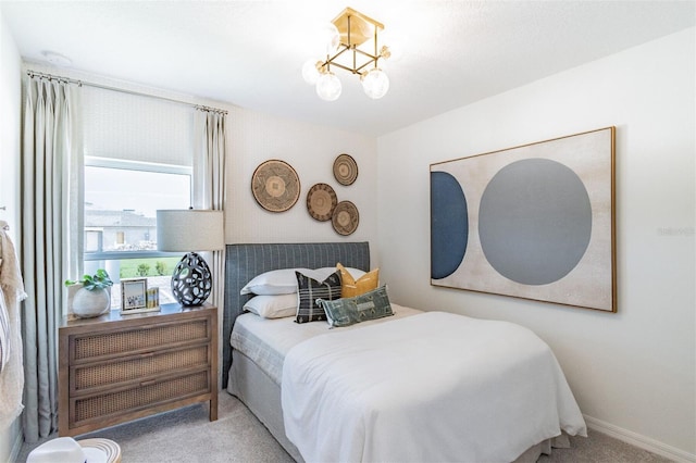 2046 Sunset Preserve Way, Port Charlotte, FL 33953 - carpeted bedroom with a chandelier and baseboards