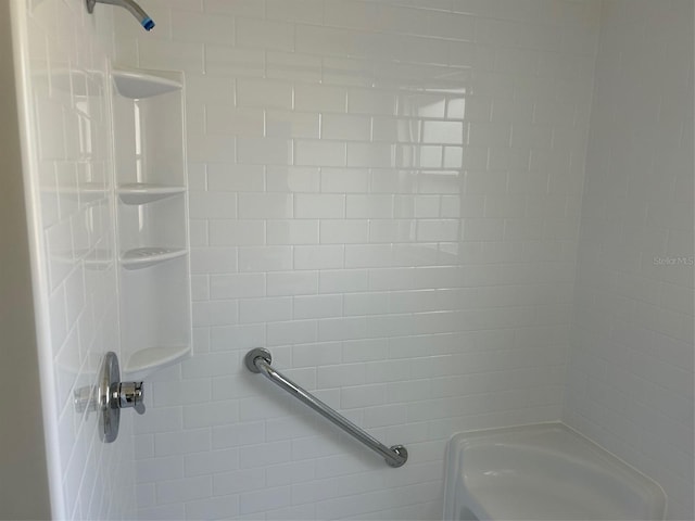 bathroom featuring a shower