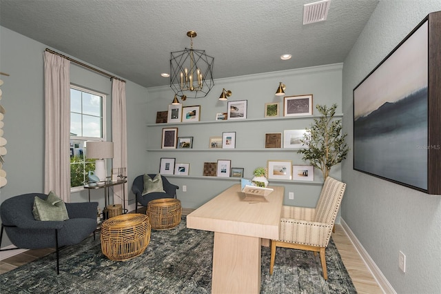 1688 Lugano Cir, North Venice, FL 34275 - office area with wood finished floors, a chandelier, a textured ceiling, baseboards, and recessed lighting