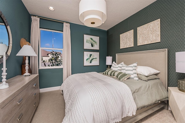 1688 Lugano Cir, North Venice, FL 34275 - carpeted bedroom featuring baseboards and a textured ceiling