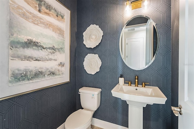 1688 Lugano Cir, North Venice, FL 34275 - half bath featuring toilet