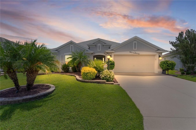 924 Figwood Loop, The Villages, FL 32163 - view of front of house with concrete driveway, stucco siding, a garage, and a front yard