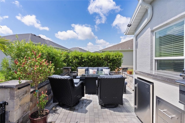 924 Figwood Loop, The Villages, FL 32163 - view of patio featuring outdoor lounge area