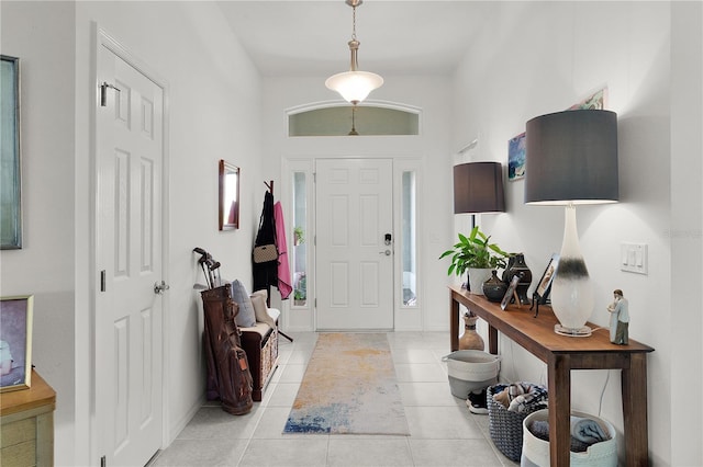 924 Figwood Loop, The Villages, FL 32163 - foyer entrance featuring light tile patterned flooring and baseboards