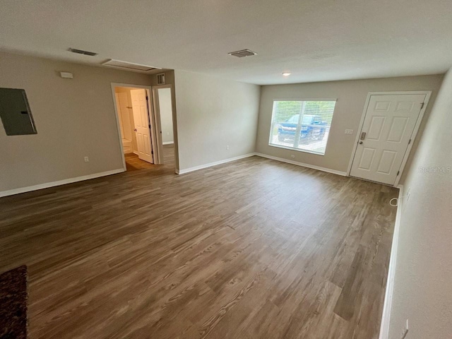 16221 SW 29th Court Rd, Ocala, FL 34473 - spare room with electric panel, wood finished floors, and baseboards