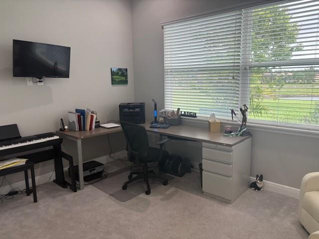 16617 5th Ave E, Bradenton, FL 34212 - home office featuring light colored carpet and baseboards