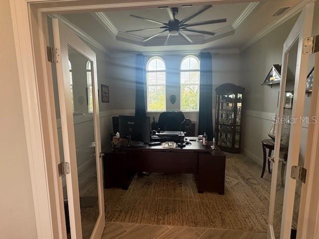 16617 5th Ave E, Bradenton, FL 34212 - home office featuring ceiling fan, a tray ceiling, crown molding, and wainscoting